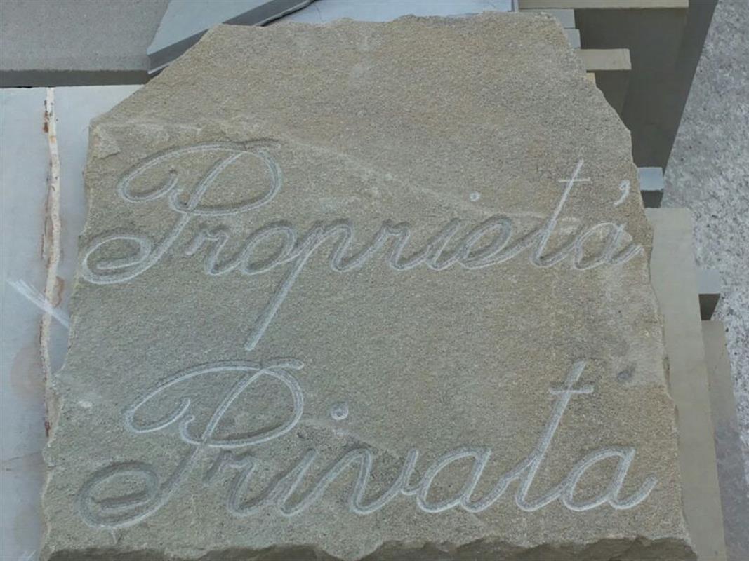 Custom made engraving of writing and numbers in Natural Stone n°14